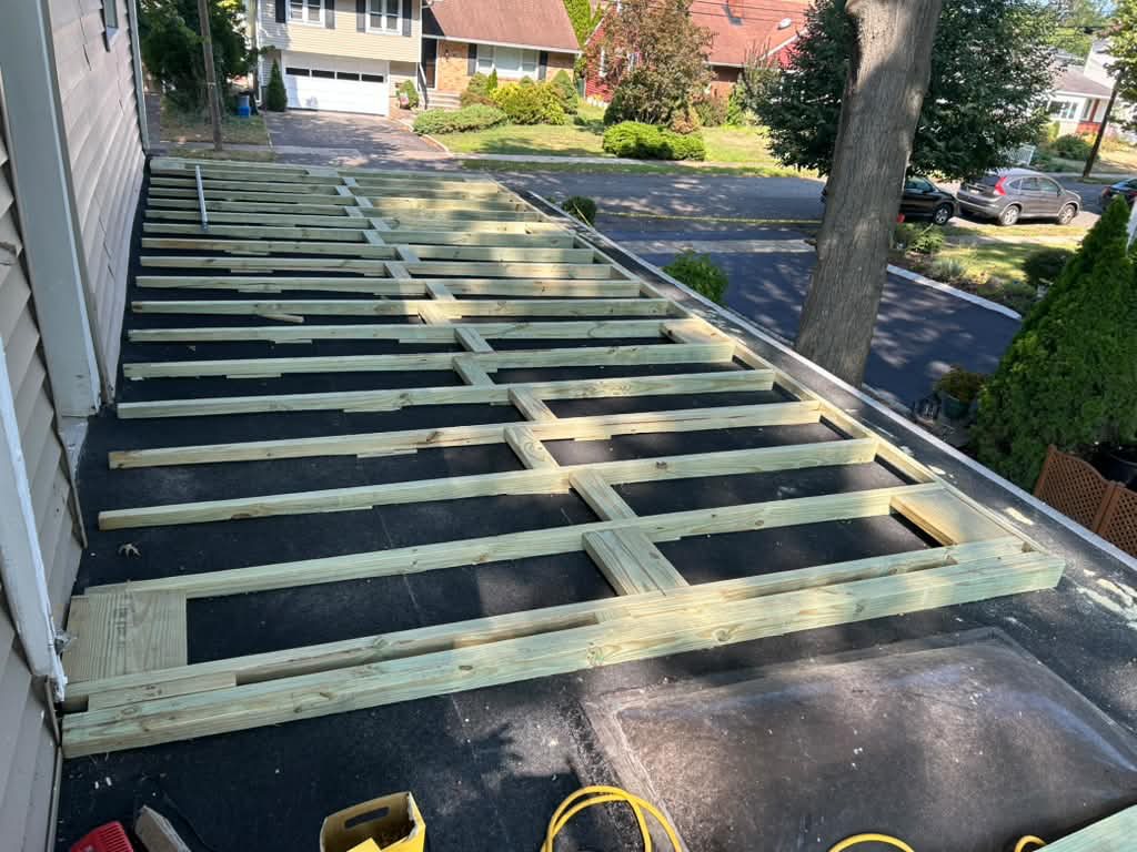 New deck framing with joists and beams in place before decking was installed